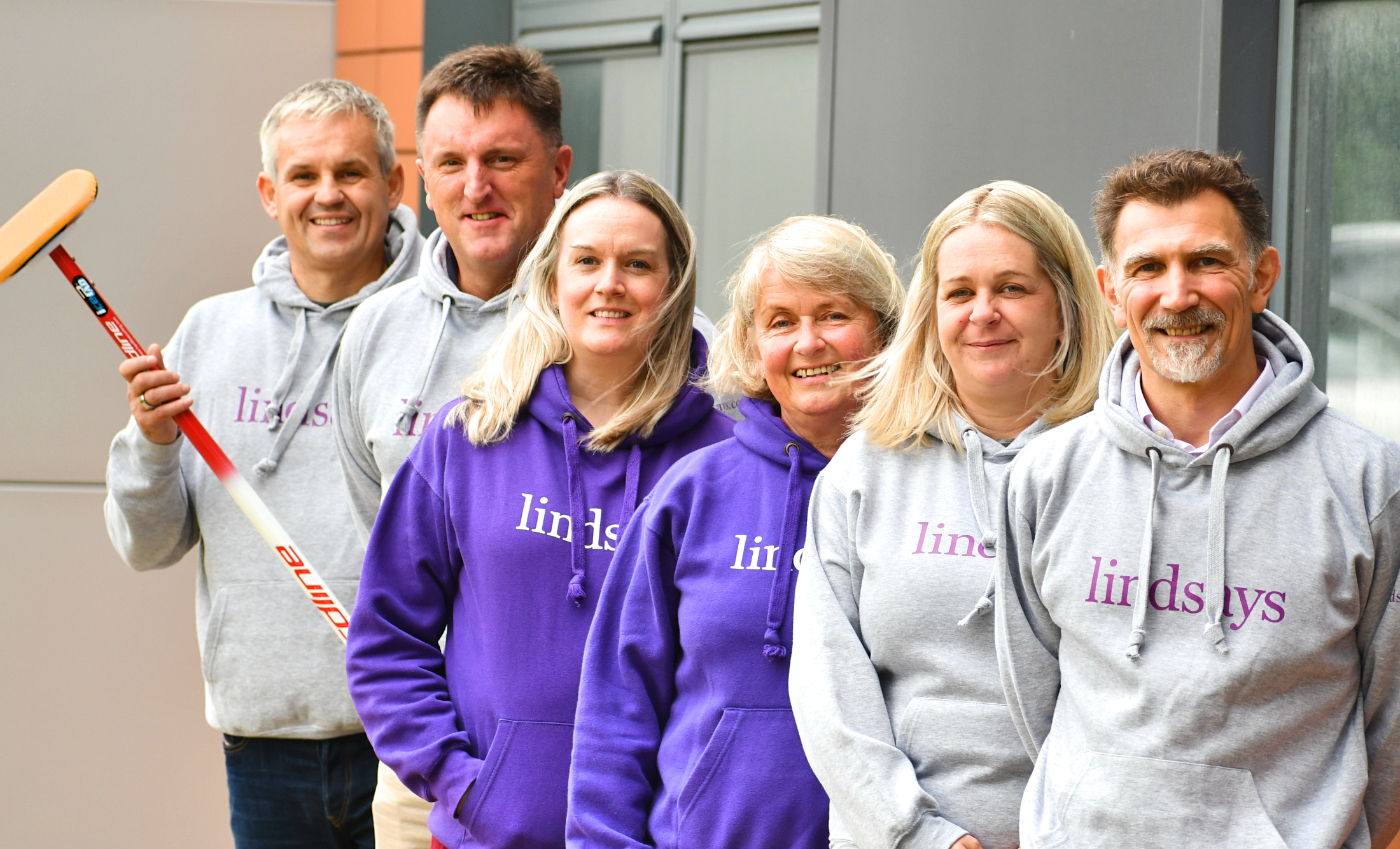 Lindsays lawyers take to the ice as part of curling club