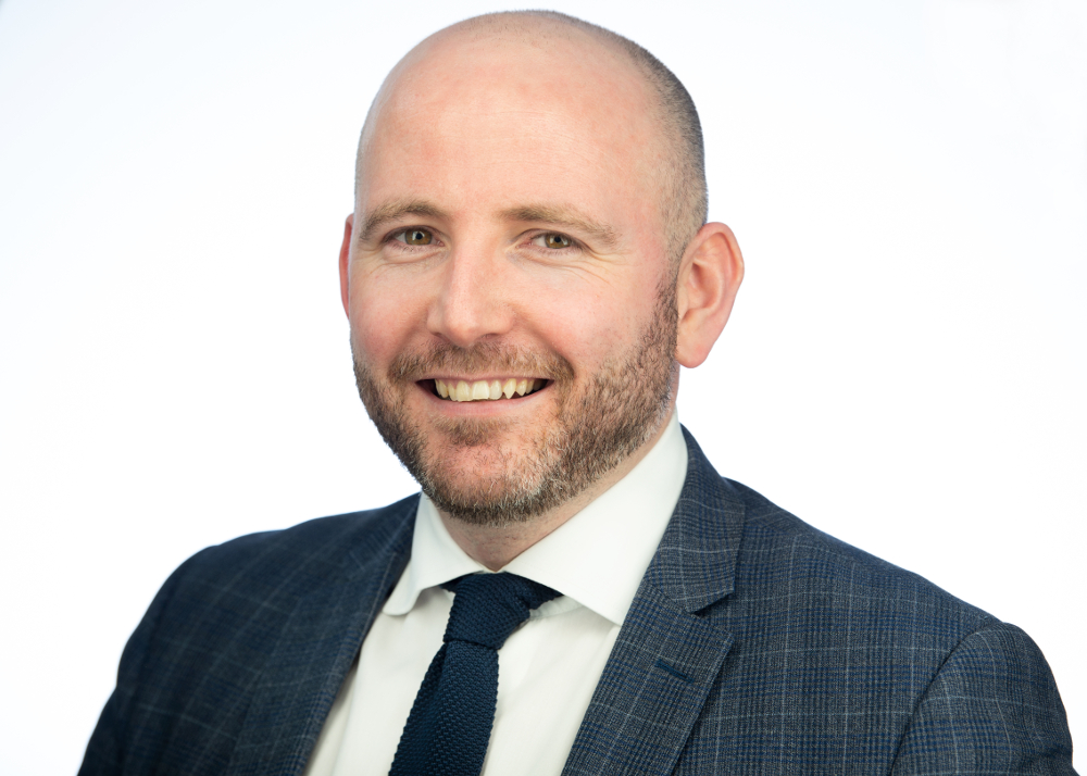 Michael McLean qualifies as a solicitor advocate