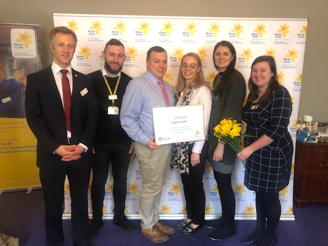 Scullion LAW raises over £230,000 for Marie Curie